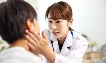 Doctor examines their patient